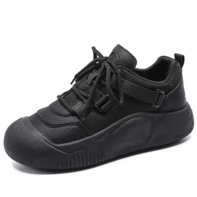 Black buckle strap accents casual shoe sneaker