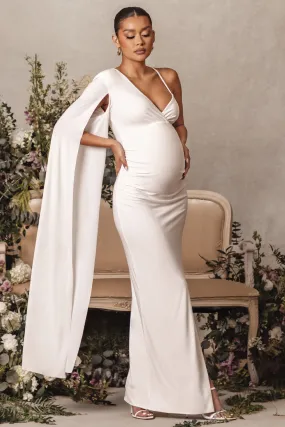 The Crown | White Asymmetric Plunge Maternity Maxi Dress with Cape Sleeve