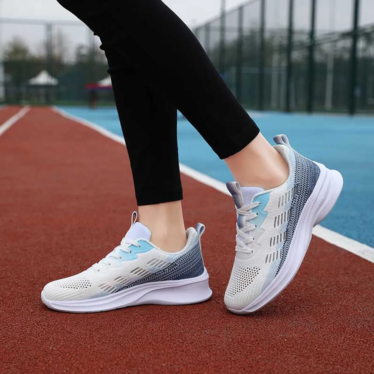 White flyknit stripe accents sport shoe sneaker